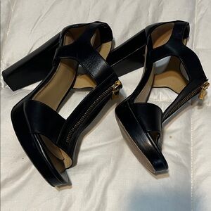 Michael Kors Black Leather T-Strap Heels with Gold Zipper Accents
